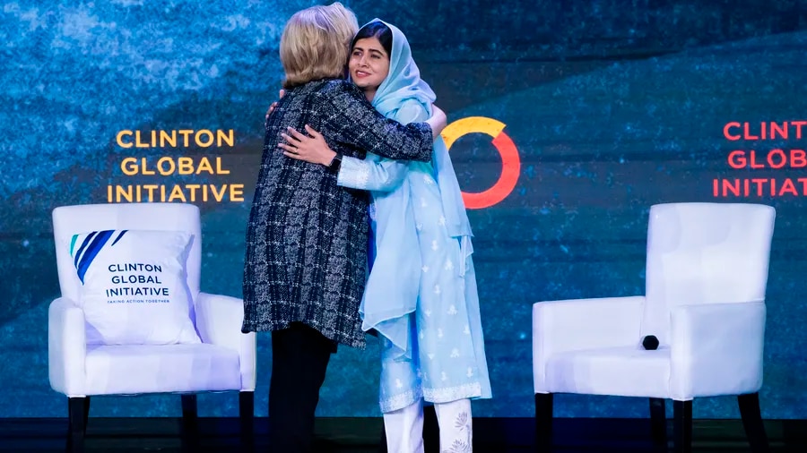 Malala Yousafzai greets Hillary Clinton at the Clinton Global Initiative on Sept. 20 in New York. (AP Photo/Julia Nikhinson) [ JULIA NIKHINSON | AP ]
