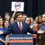 Gov. Ron DeSantis addresses the crowd before publicly signing HB 7, the "Individual Freedom Act," also dubbed the "Stop WOKE" bill during a news conference at Mater Academy Charter Middle/High School in Hialeah Gardens in April 2022. [ DANIEL A. VARELA | AP ]