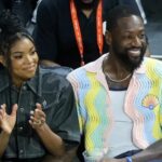 Gabrielle Union, left, and Dwyane Wade sit courtside as they attend the 2023 WNBA All-Star Game at Michelob ULTRA Arena on July 15, 2023, in Las Vegas. [ ETHAN MILLER | Getty Images North America ]