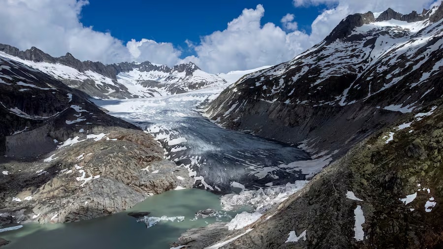 A lake of meltwater forms on the tongue of the Rhone Glacier near Goms, Switzerland, on June 13, 2023. Europe is the fastest-warming continent, and its temperatures are rising at roughly twice the global average, two top climate monitoring organizations reported on April 22, 2024, warning of the consequences for human health, glacier melt and economic activity. (AP Photo/Matthias Schrader, File) [ MATTHIAS SCHRADER | AP ]